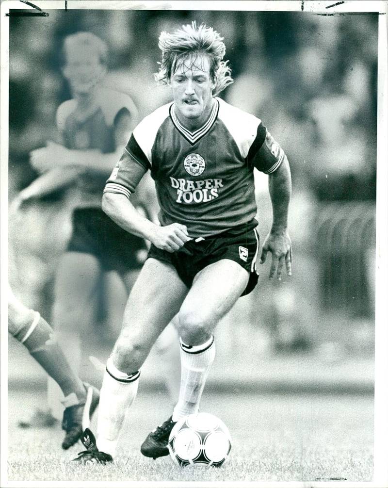 Vintage photo of Mark Dennis in action, Southampton F.C.